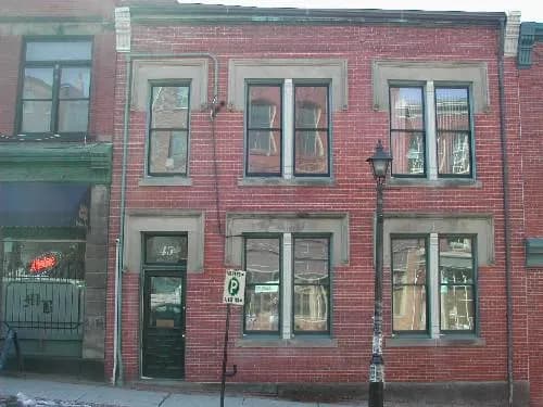 This image shows a contextual view of the building, 2005; City of Saint John